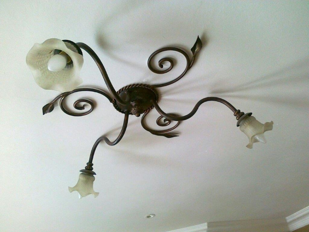 Wrought iron chandelier made by Exclusivio Wrought Iron Designs